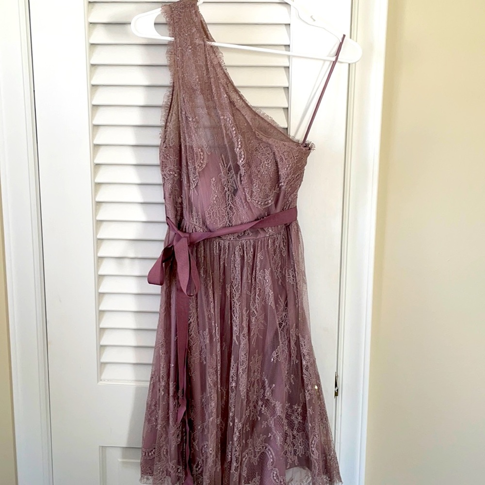 Lilac purple one shoulder lace dress.